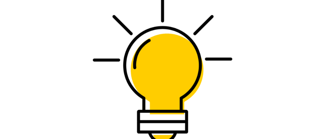 Illuminated gold and black light bulb.