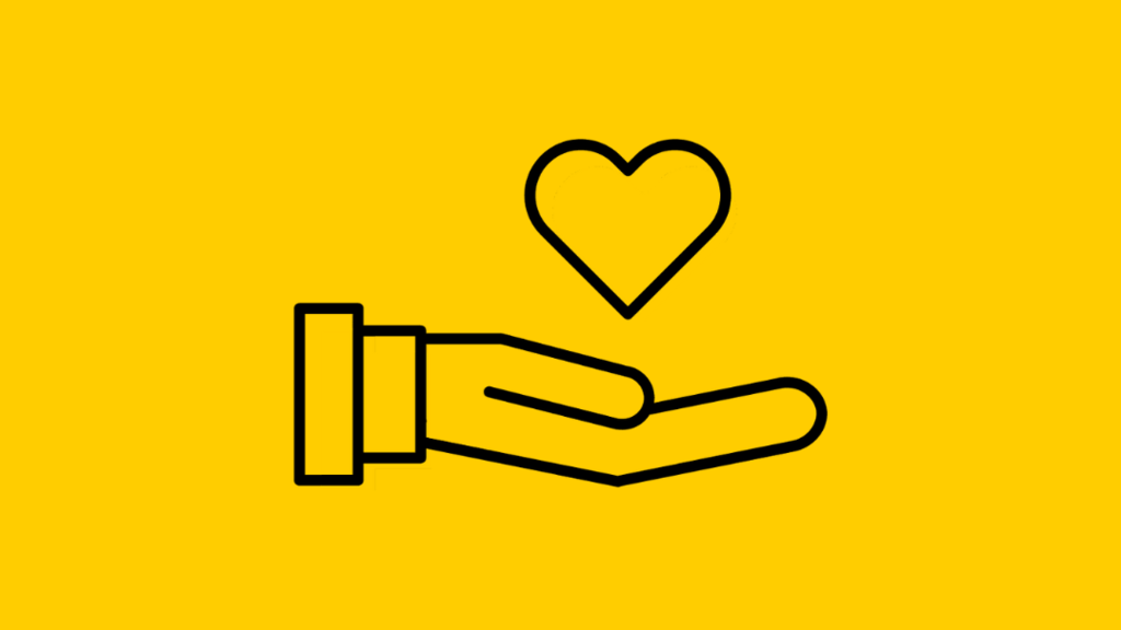 An outline of a hand holds a heart on a black background.